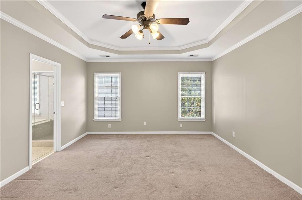 5731 Vinings Retreat Way Southwest Mableton, GA 30126 - Photo 18 of 32 a view of an empty room with a window