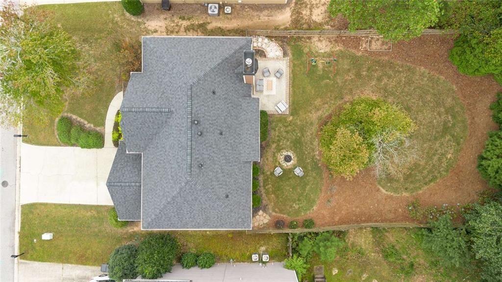 5731 Vinings Retreat Way Southwest Mableton, GA 30126 - Photo 29 of 32 an aerial view of a house with a yard