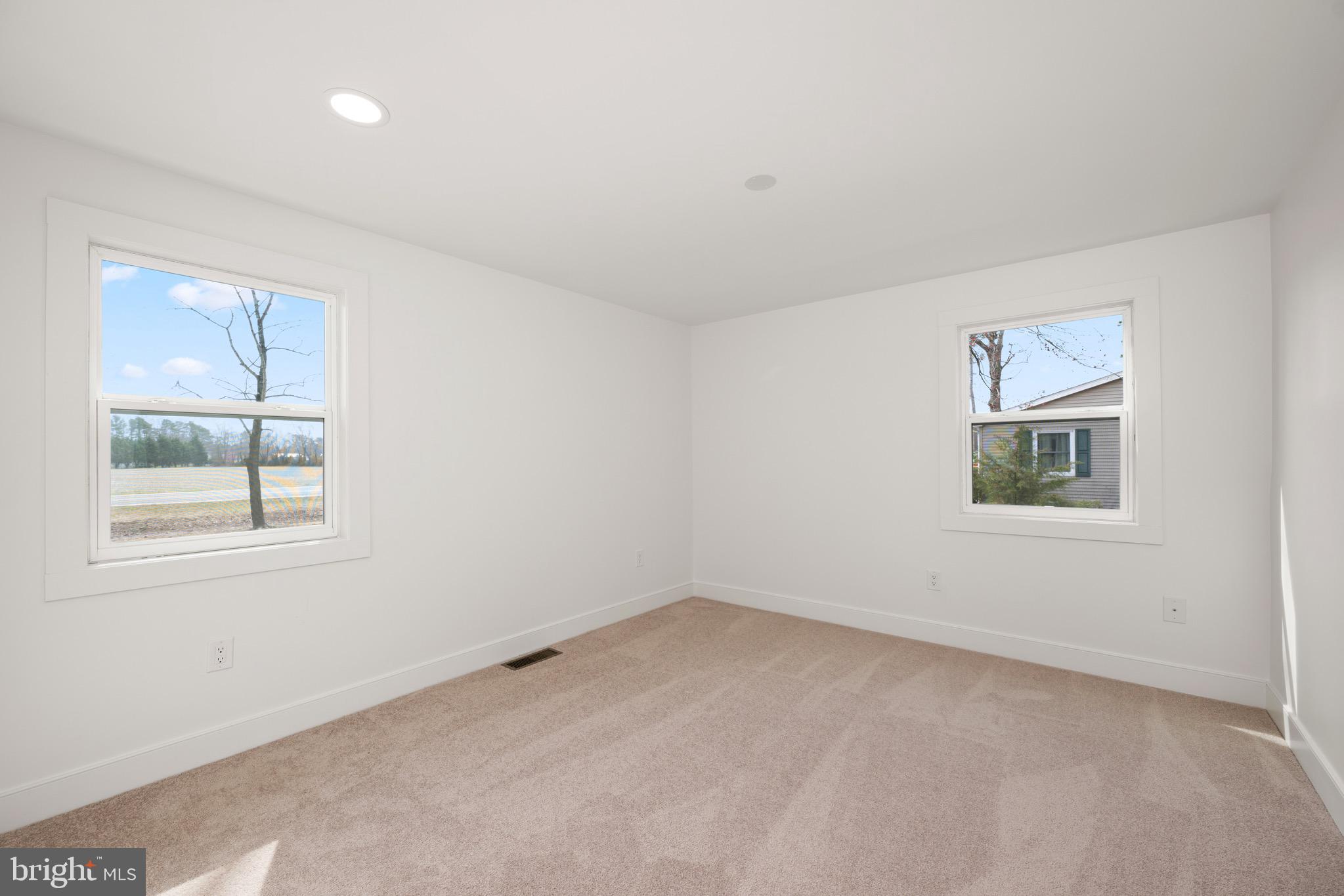 18316 Shingle Point Road Georgetown, DE 19947 - Photo 25 of 35 an empty room with a window