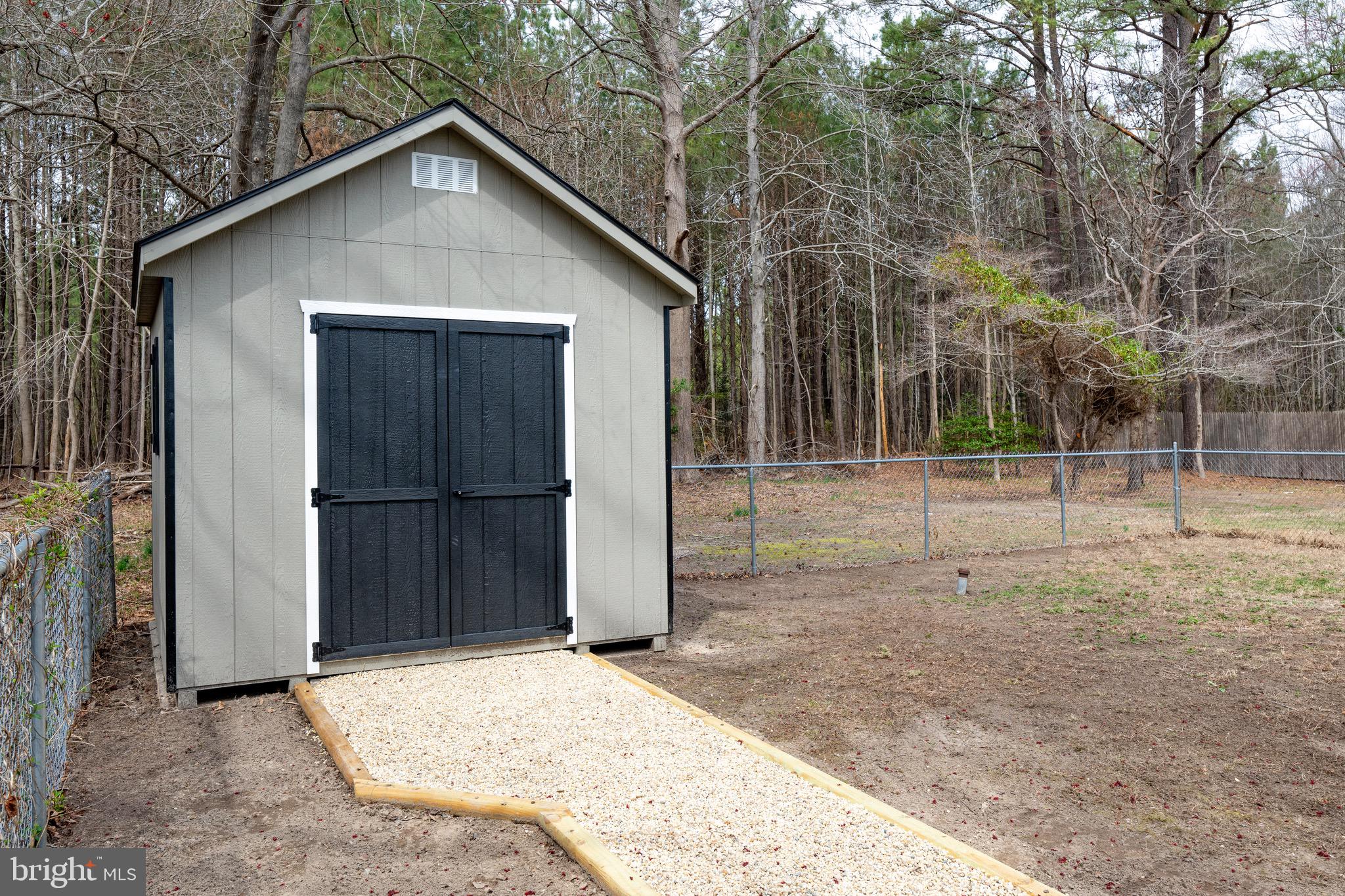 18316 Shingle Point Road Georgetown, DE 19947 - Photo 30 of 35 a view of backyard of house