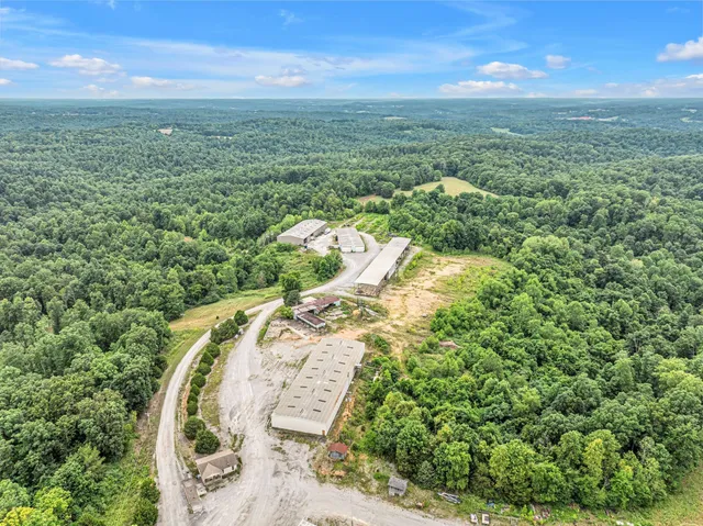 a view of a field with an outdoor space