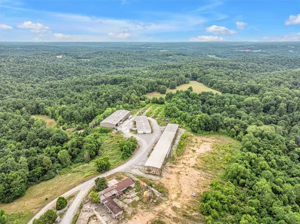 a view of a field with an outdoor space