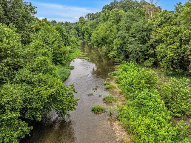 a view of a yard with an outdoor space