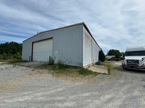 a view of a road with a yard