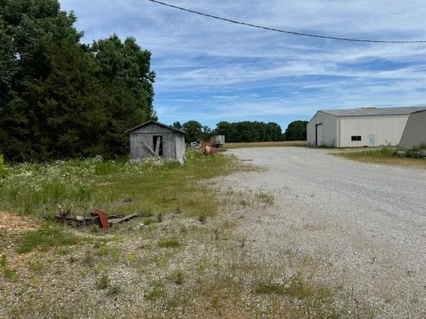 a view of parking garage with cars
