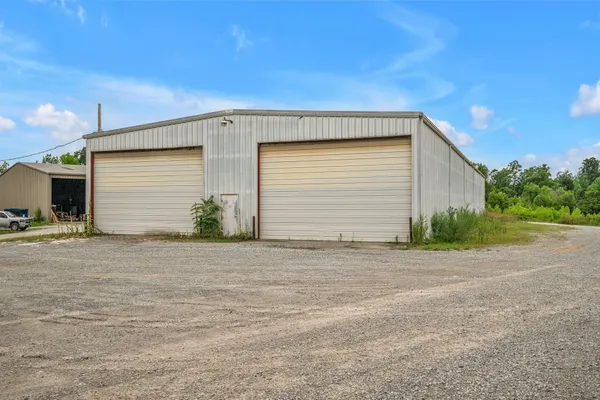 a view of a green yard next to a yard