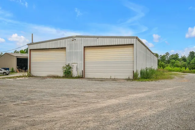 a view of a green yard next to a yard