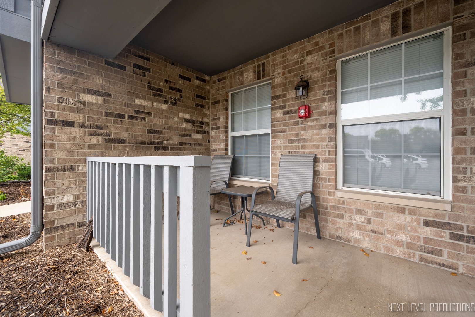 43 Foxcroft Road, Unit 119 Naperville, IL 60565 - Photo 2 of 13 a balcony view with a outdoor space