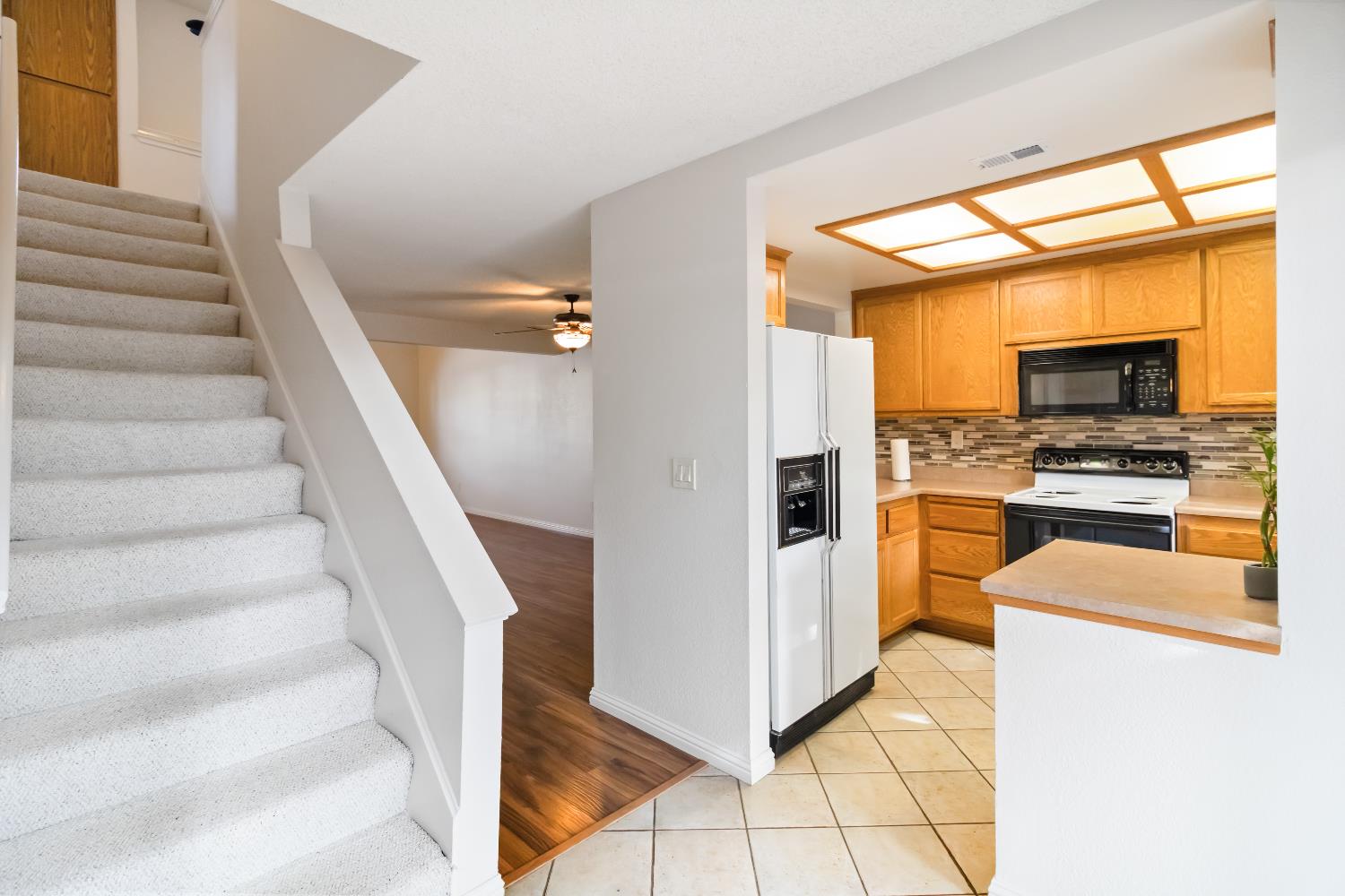 2831 Edison Avenue Sacramento, CA 95821 - Photo 11 of 27 a view of kitchen with sink microwave and refrigerator