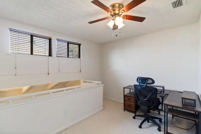 a room with a desk and a chair