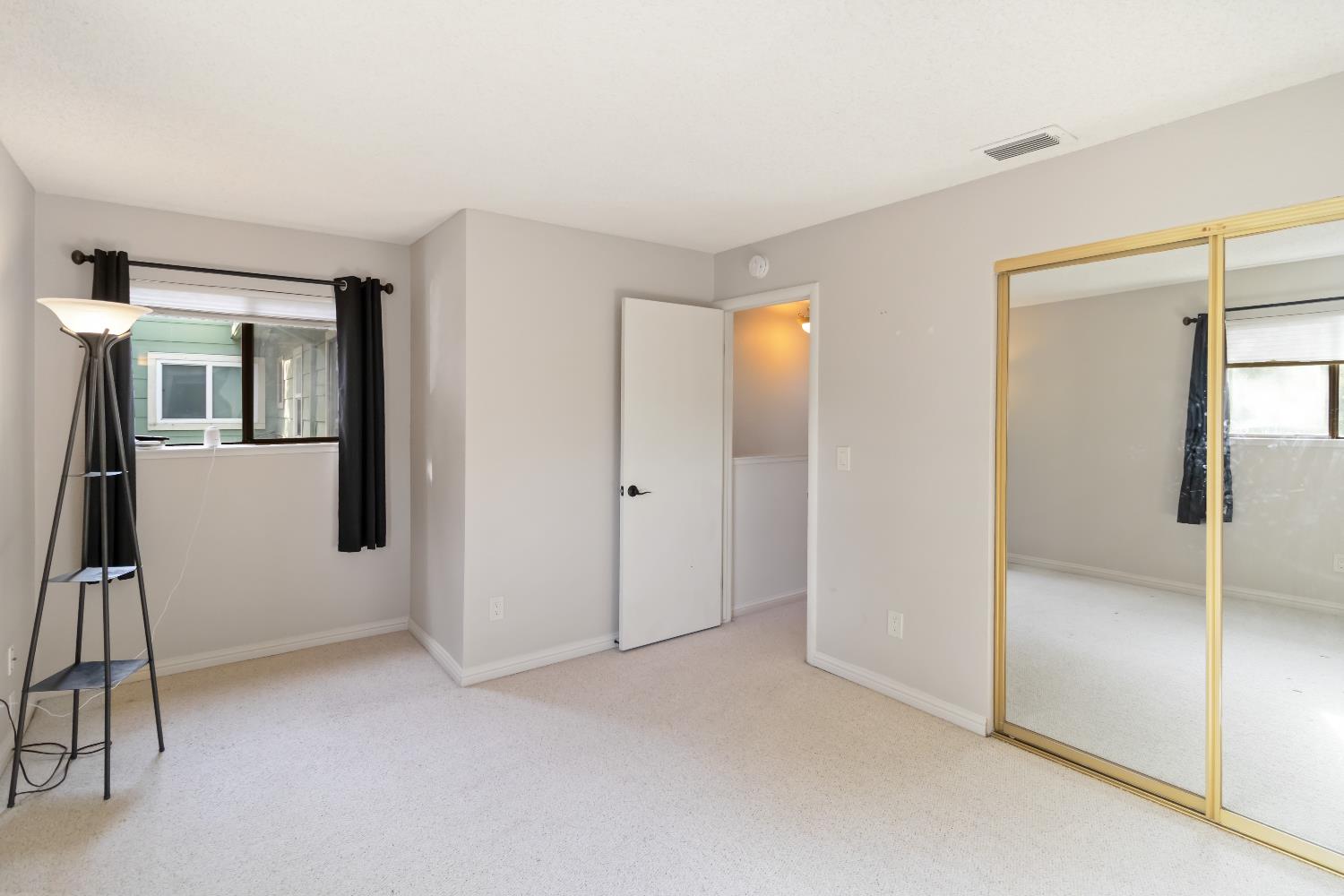 2831 Edison Avenue Sacramento, CA 95821 - Photo 19 of 27 an empty room with windows