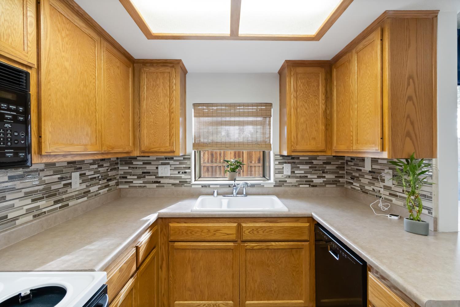 2831 Edison Avenue Sacramento, CA 95821 - Photo 10 of 27 a bathroom with a sink and a mirror