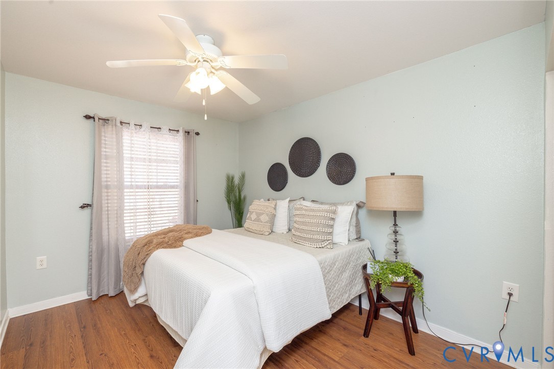 3520 East Richmond Road, Unit U106 Richmond, VA 23223 - Photo 16 of 18 a bedroom with a bed and a window