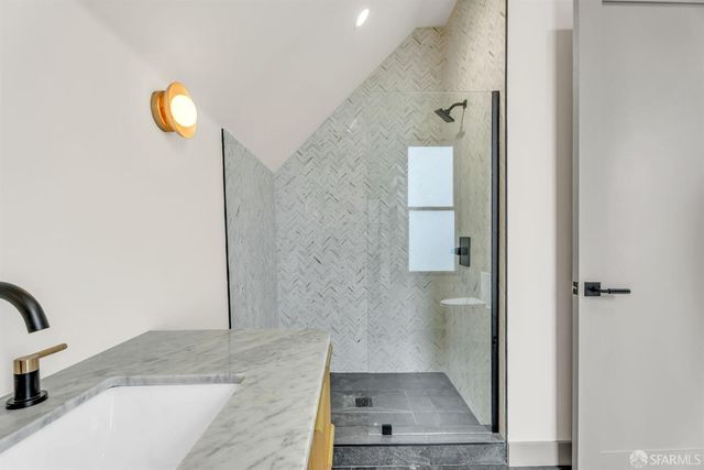 a living room with a furniture and a window