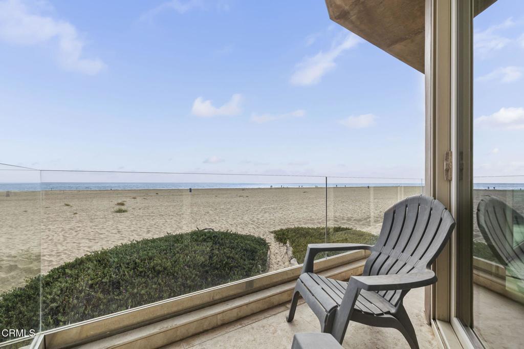 3629 Ocean Drive Oxnard, CA 93035 - Photo 15 of 60 a view of a balcony with chair and ocean view