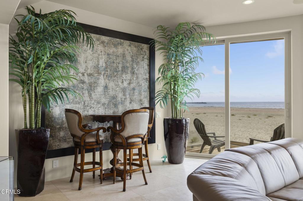 3629 Ocean Drive Oxnard, CA 93035 - Photo 16 of 60 a living room with furniture and a potted plant