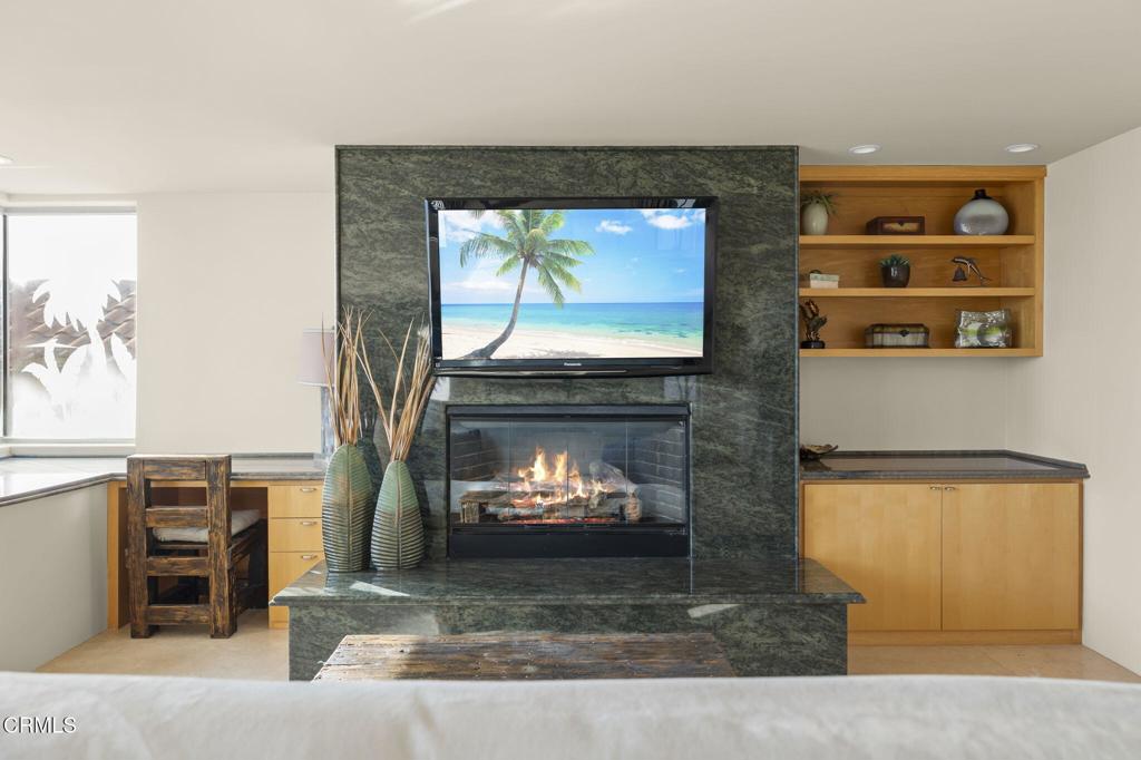 3629 Ocean Drive Oxnard, CA 93035 - Photo 31 of 60 a living room with furniture and a fireplace