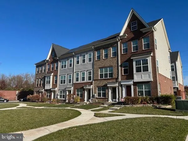 a view of a building and a yard