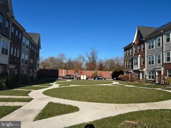 a view of a building with a yard