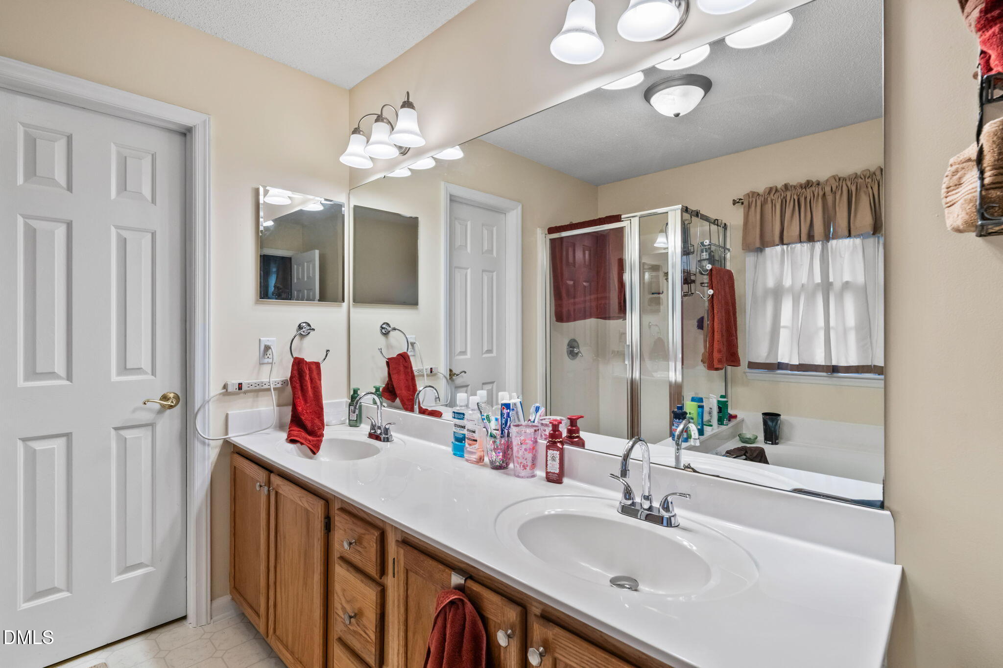 9104 Deerland Grove Drive Raleigh, NC 27615 - Photo 32 of 42 Primary Bath