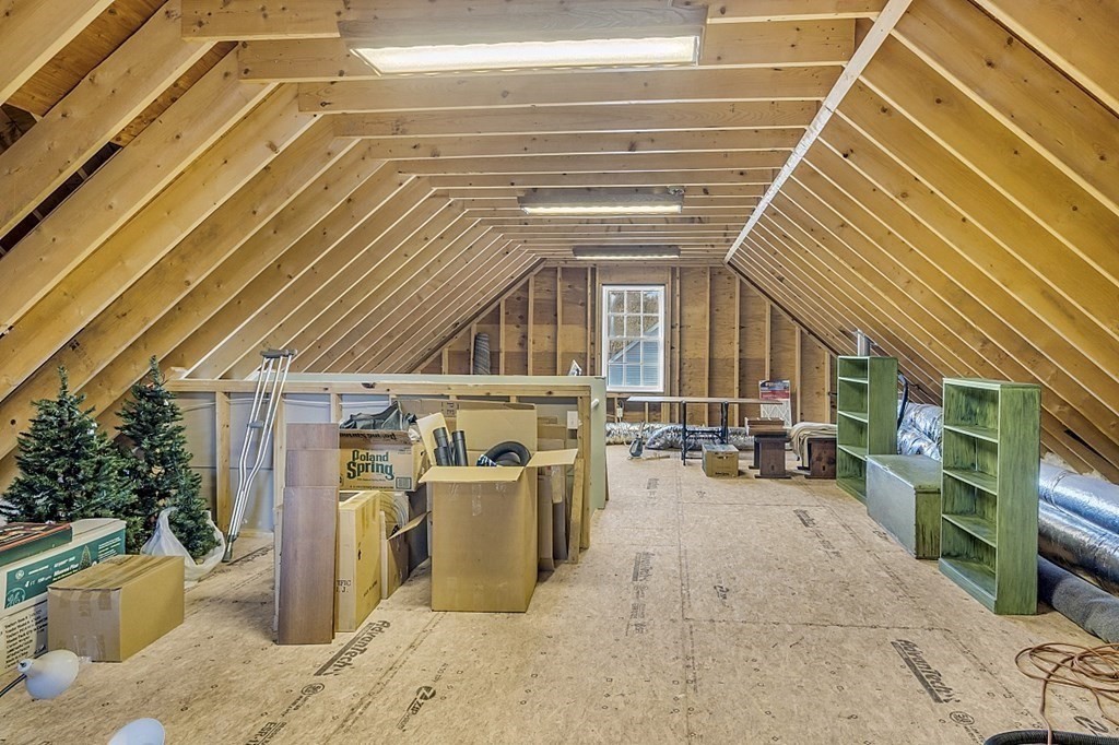 79 River Road Pepperell, MA 01463 - Photo 18 of 30 a view of a patio with table and chairs
