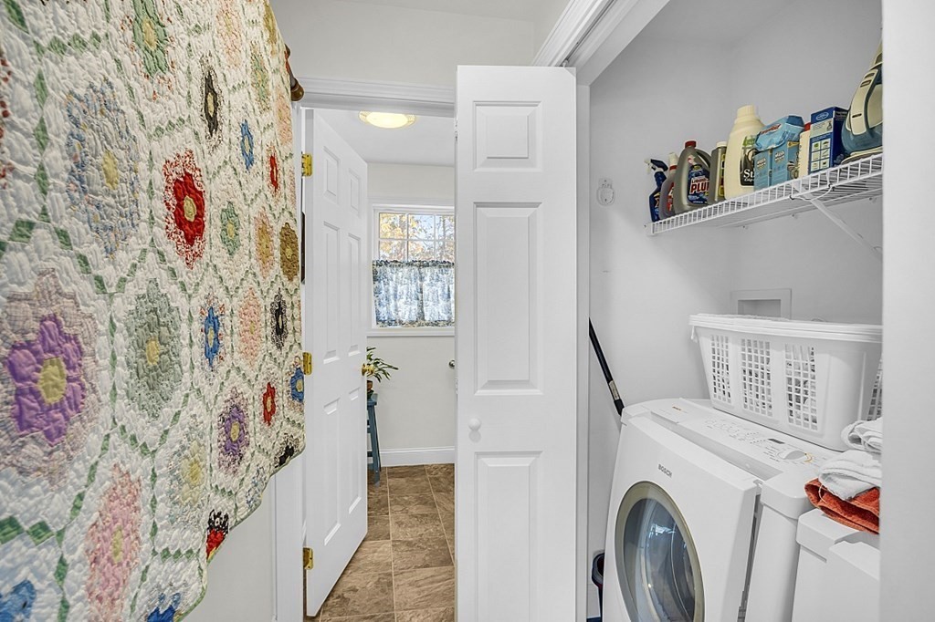 79 River Road Pepperell, MA 01463 - Photo 9 of 30 a view of storage and utility room with washer and dryer