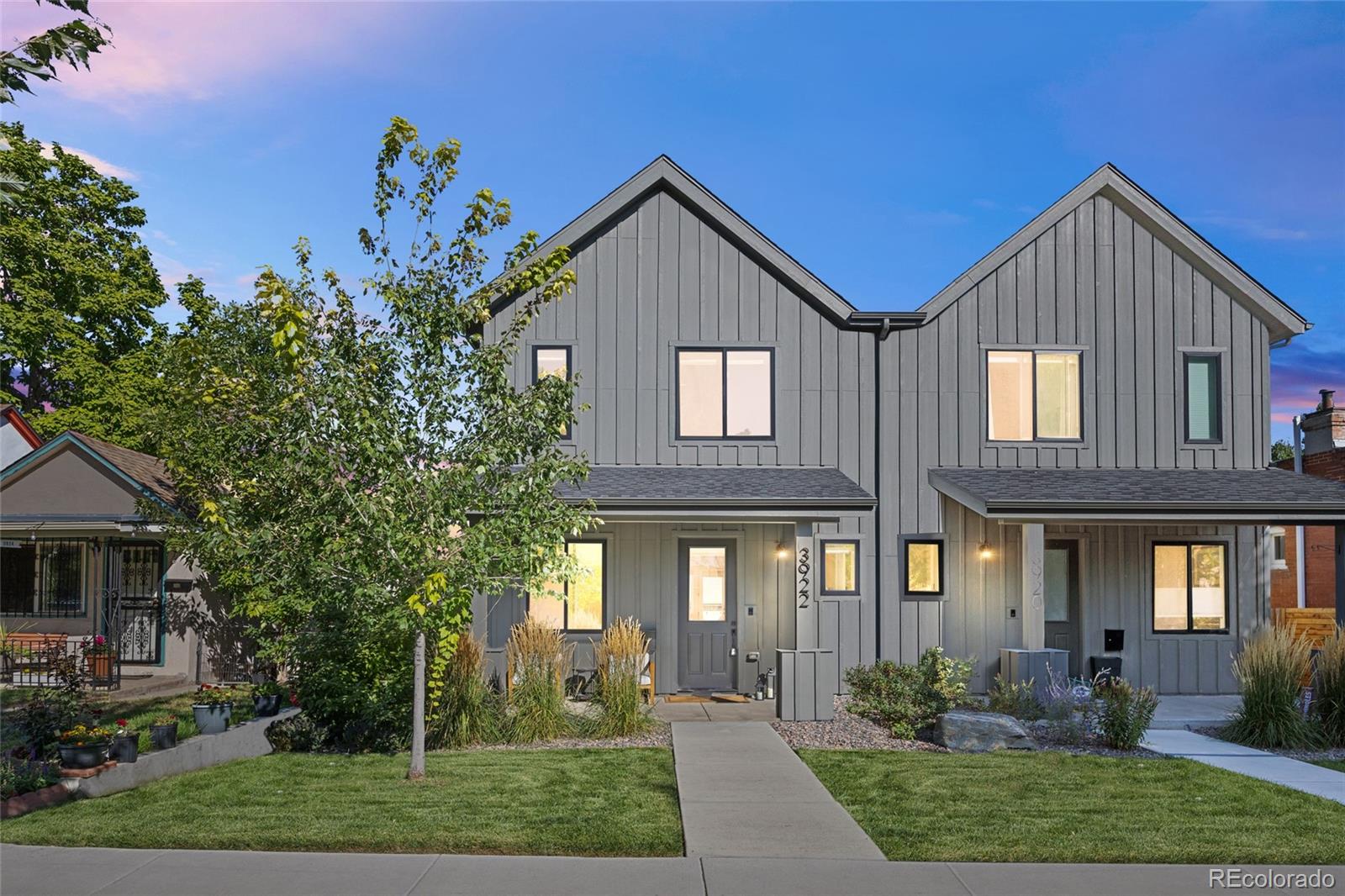3922 Osage Street Denver, CO 80211 - Photo 2 of 44 a front view of a house with garden