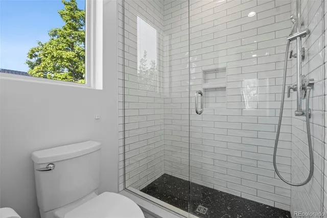 a view of livingroom with furniture and windows