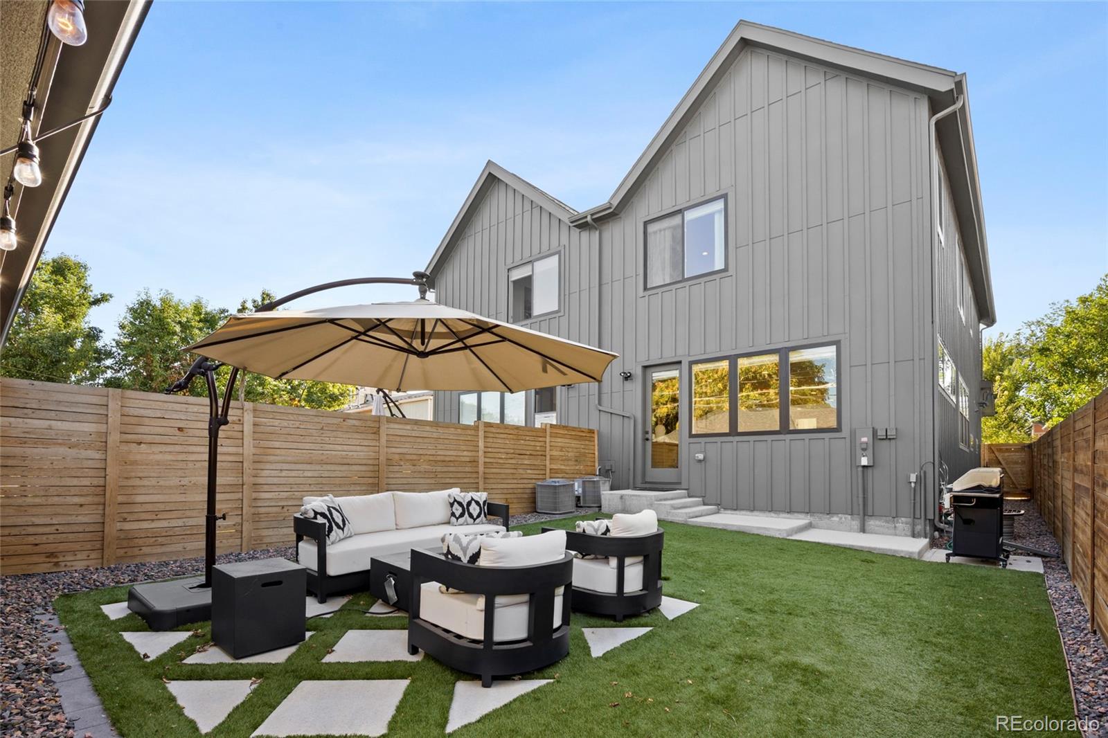 3922 Osage Street Denver, CO 80211 - Photo 36 of 44 a view of a house with backyard and sitting area