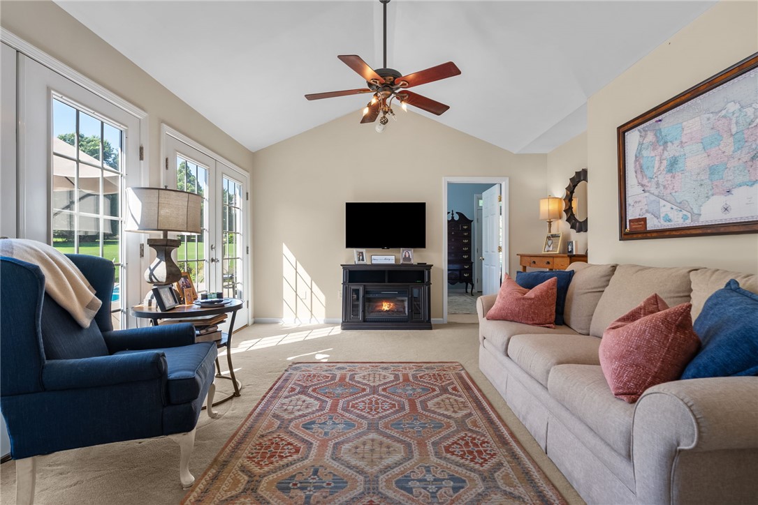 3513 Hopewell Road Anderson, SC 29621 - Photo 8 of 50 French doors open to outdoor serenity, complementing the comfort of this inviting living area.