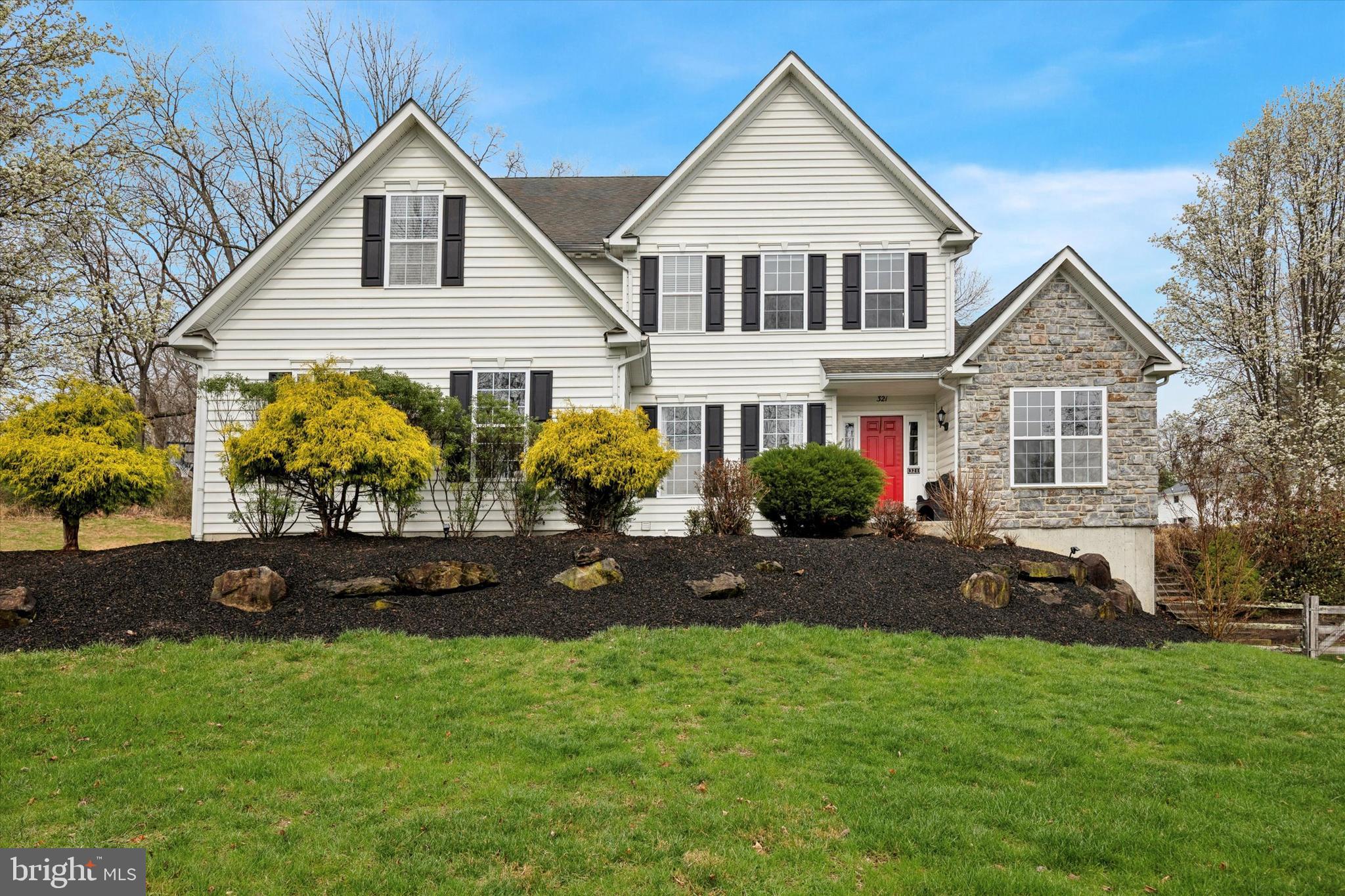 321 Lenni Road Lenni, PA 19052 - Photo 1 of 35 a front view of a house with garden