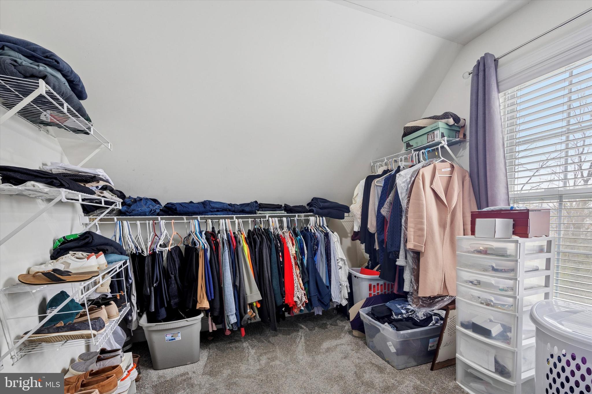 321 Lenni Road Lenni, PA 19052 - Photo 17 of 35 a view of walk in closet with clothes and shoes