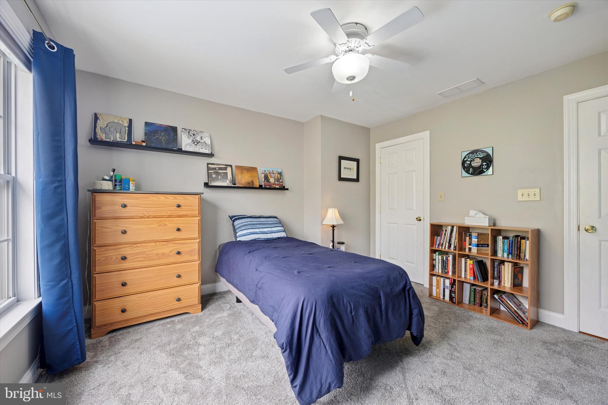 321 Lenni Road Lenni, PA 19052 - Photo 22 of 35 a bedroom with a bed and a book shelf