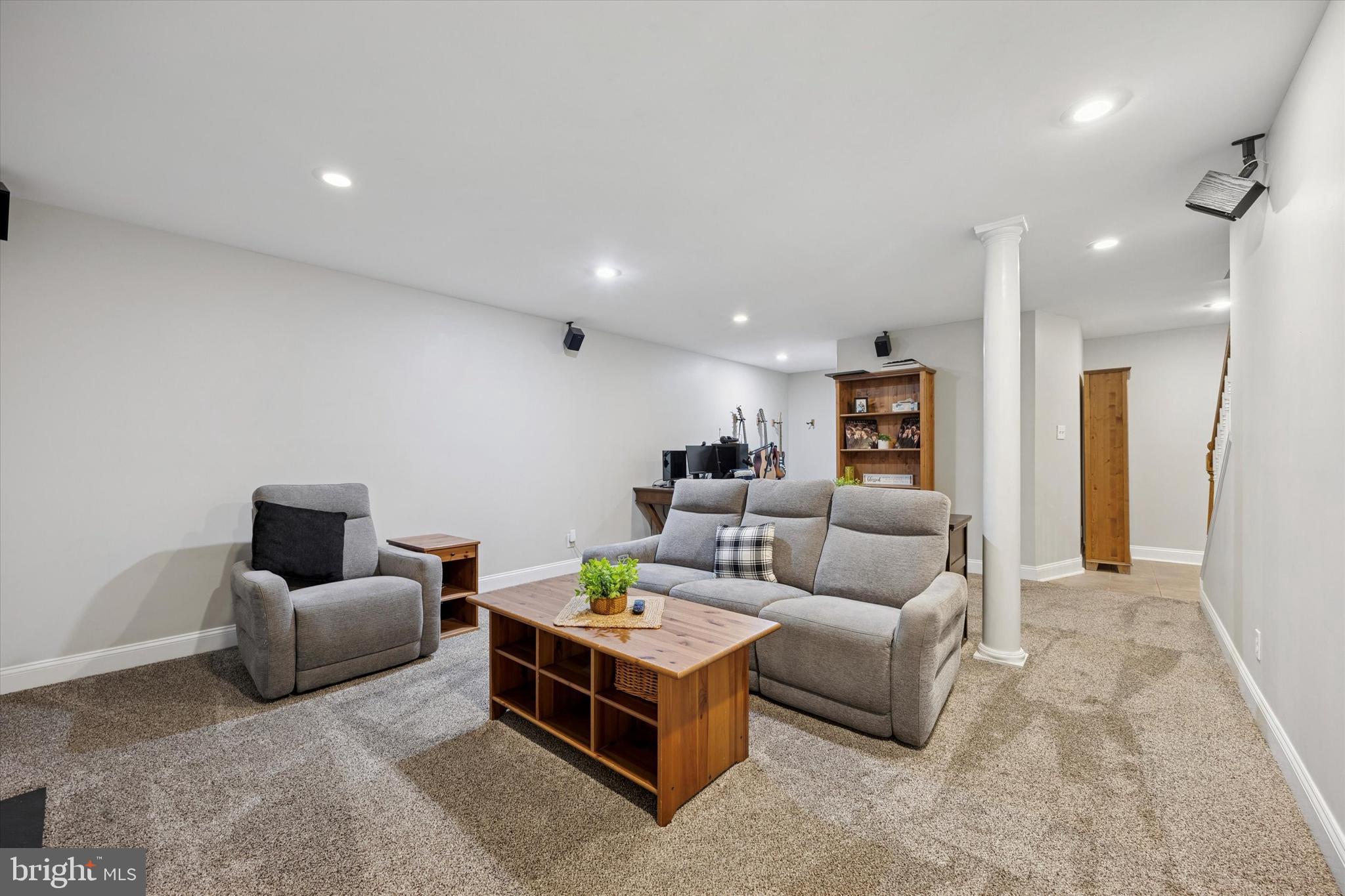 321 Lenni Road Lenni, PA 19052 - Photo 29 of 35 a living room with furniture and a couch