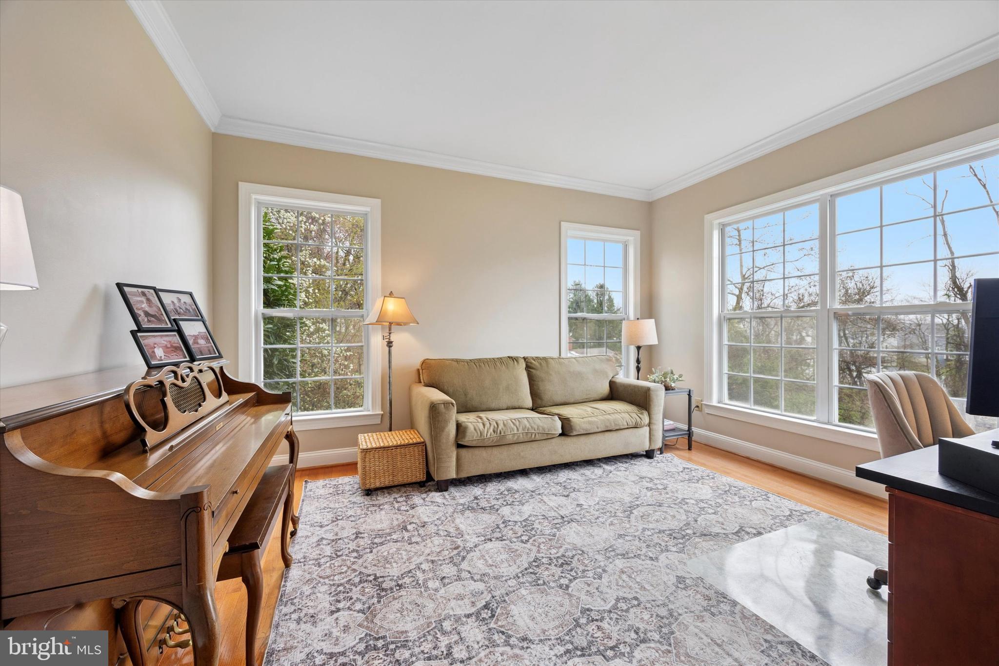 321 Lenni Road Lenni, PA 19052 - Photo 3 of 35 a living room with furniture and a floor to ceiling window