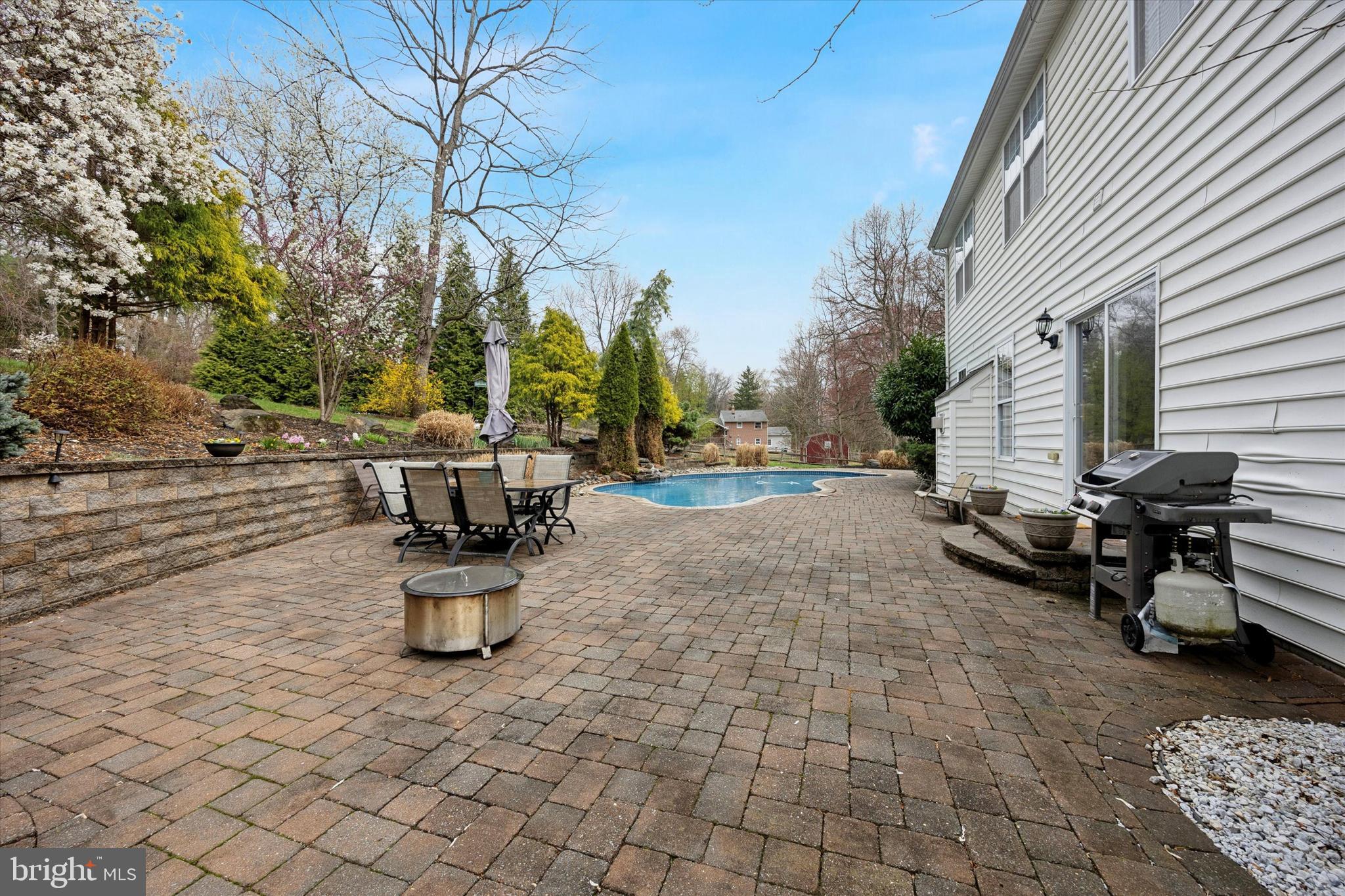 321 Lenni Road Lenni, PA 19052 - Photo 31 of 35 a view of the patio with dining table and chairs