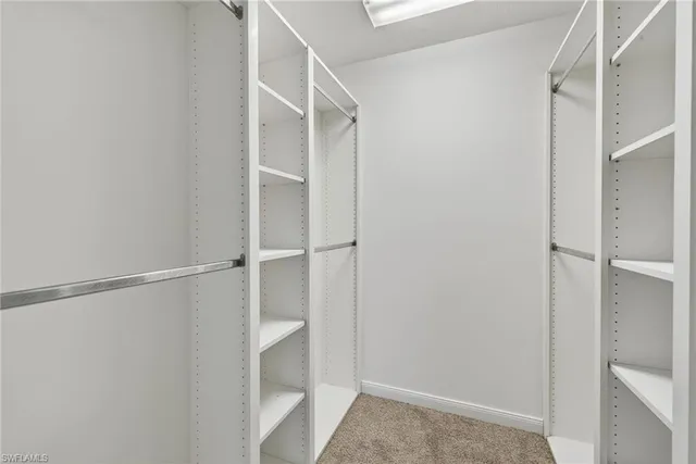 a view of an empty walk in closet
