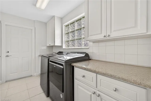 a view of a swimming pool with a porch