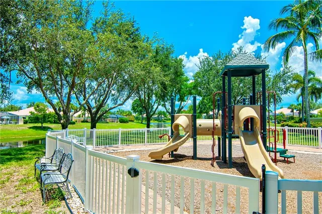 a view of a dining room with furniture and a wooden floor