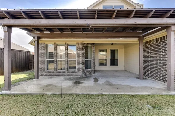 a view of a house with a patio