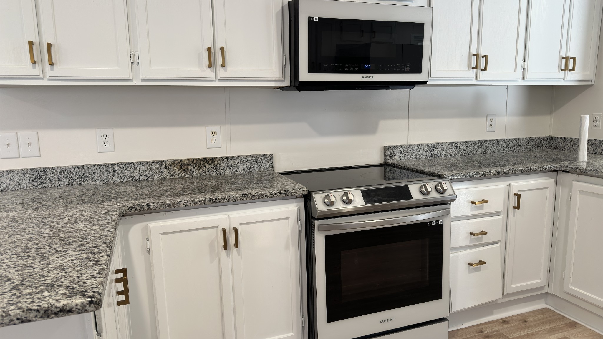 462 Pole Hill Road Goodlettsville, TN 37072 - Photo 20 of 41 a kitchen with granite countertop white cabinets and stainless steel appliances