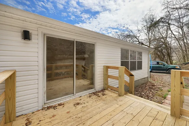 a view of a backyard of a house