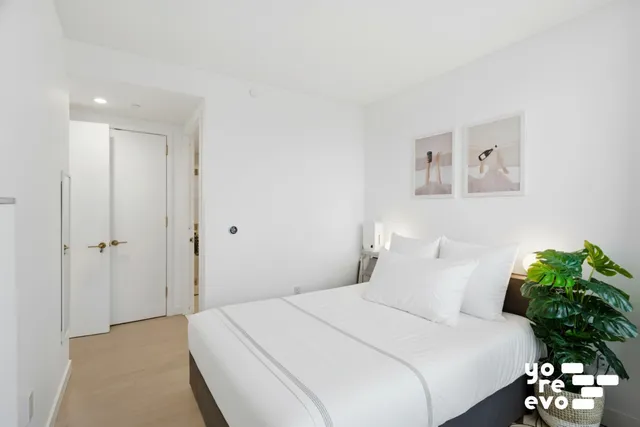 a kitchen with a stove and a refrigerator