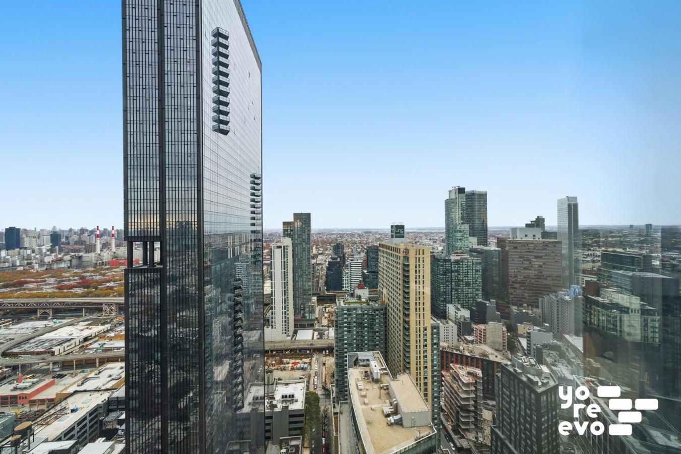 3 Court Square, Unit 4308 Queens, NY 11101 - Photo 8 of 13 a view of a city with tall buildings