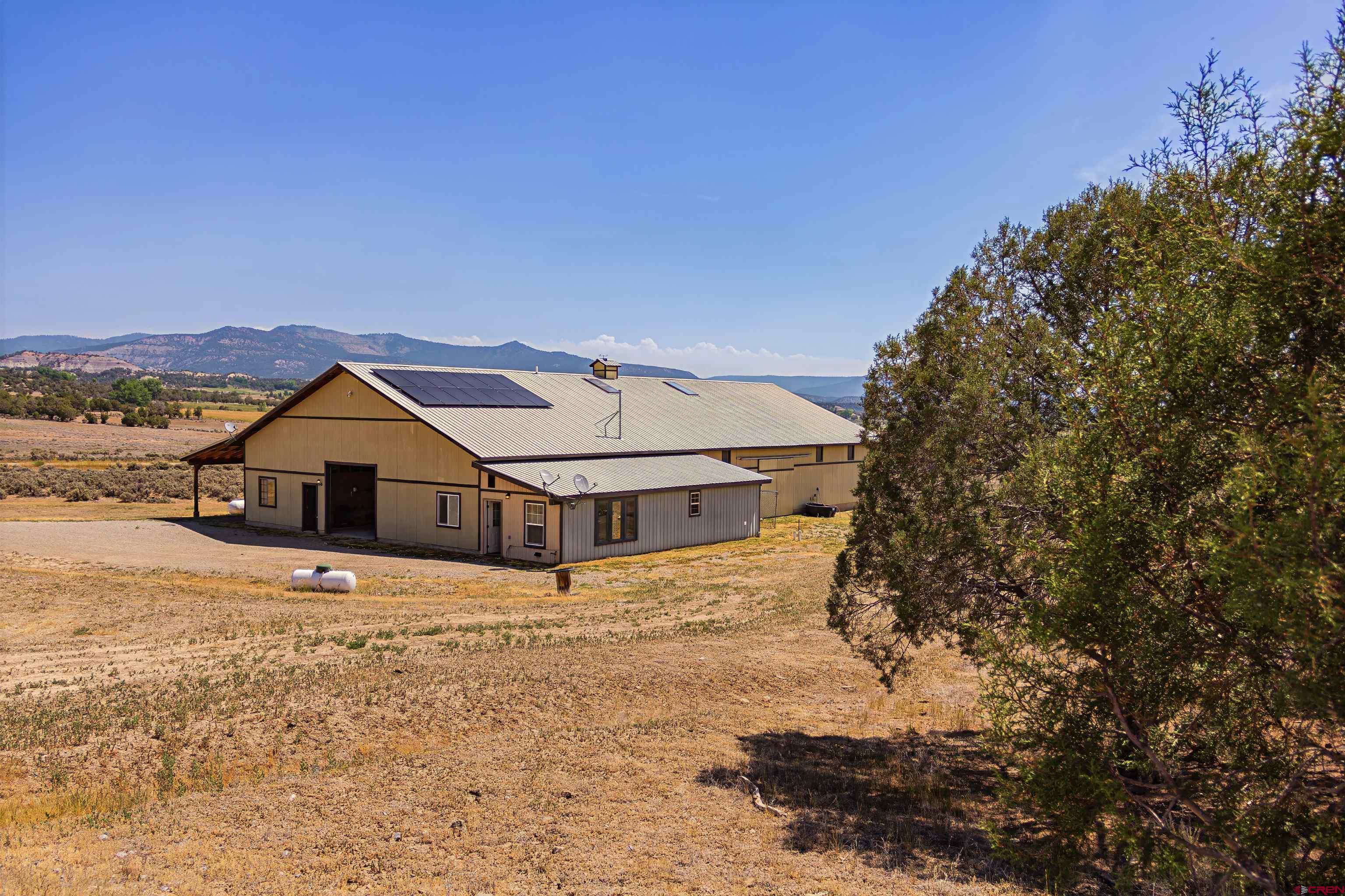 320 County Road 329 Ignacio, CO 81137 - Photo 2 of 45 a view of a house with a yard
