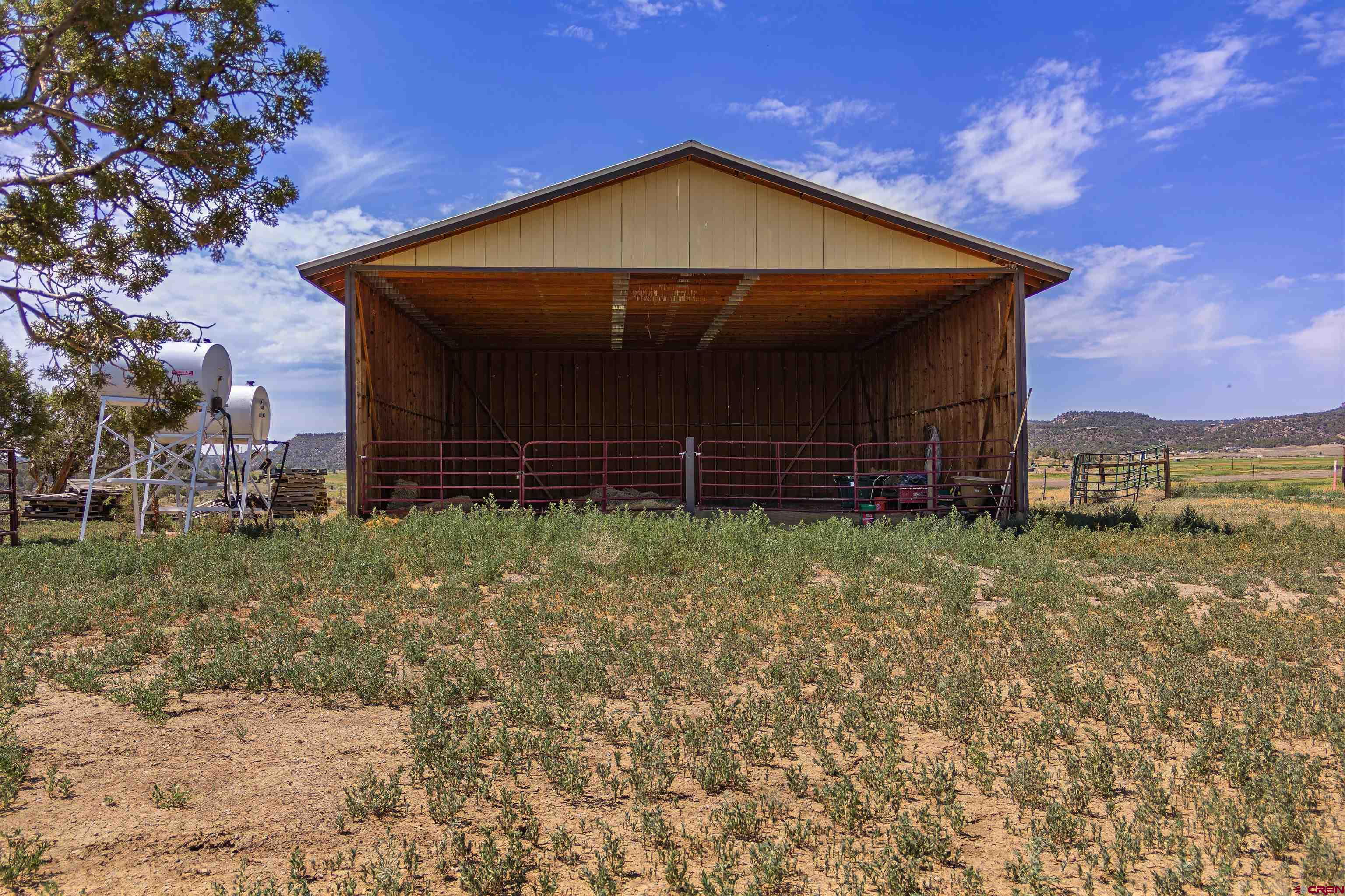 320 County Road 329 Ignacio, CO 81137 - Photo 21 of 45 a front view of a house with garden