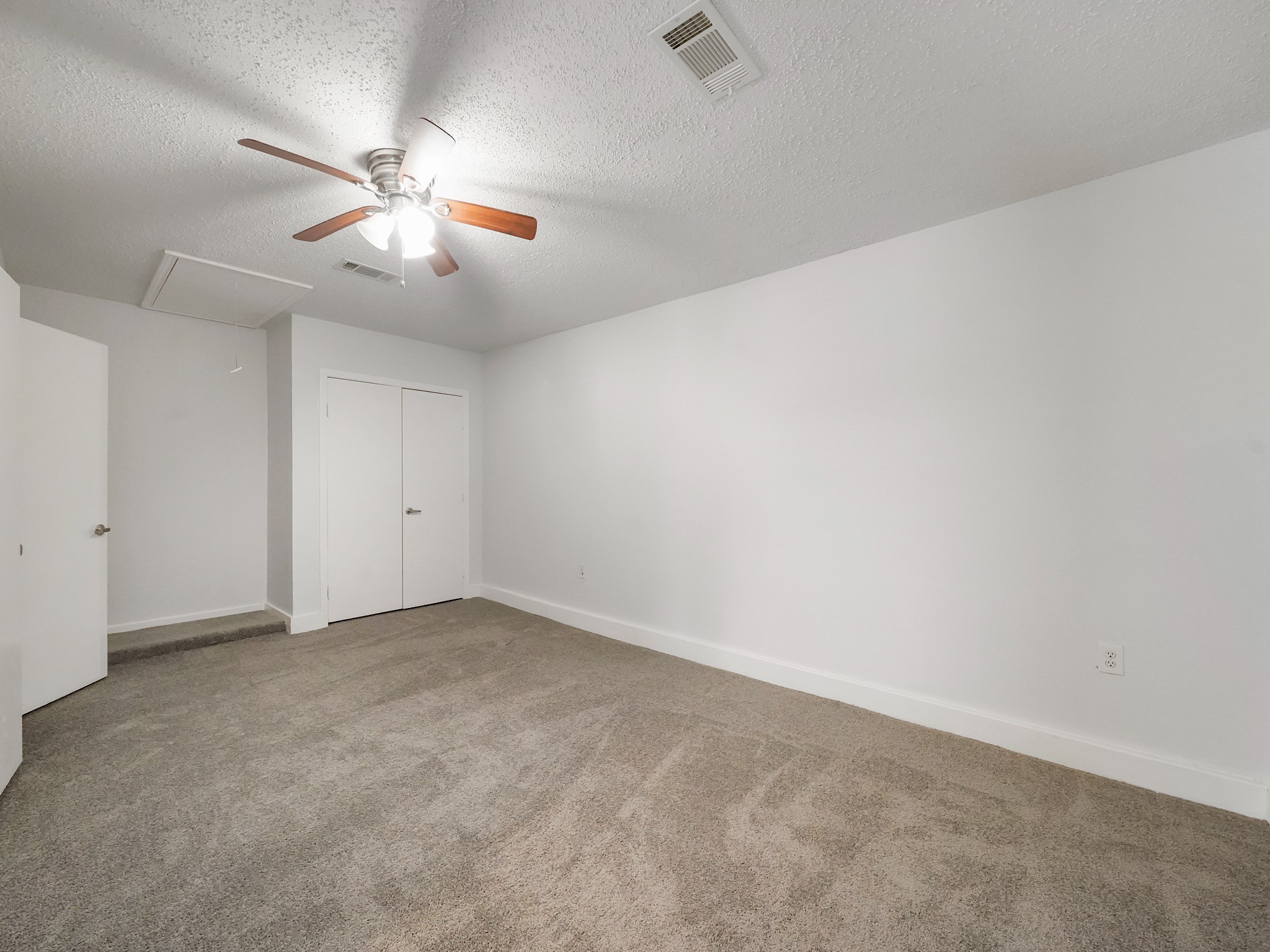 23338 Prairie Bird Drive Spring, TX 77373 - Photo 14 of 18 wooden floor in an empty room