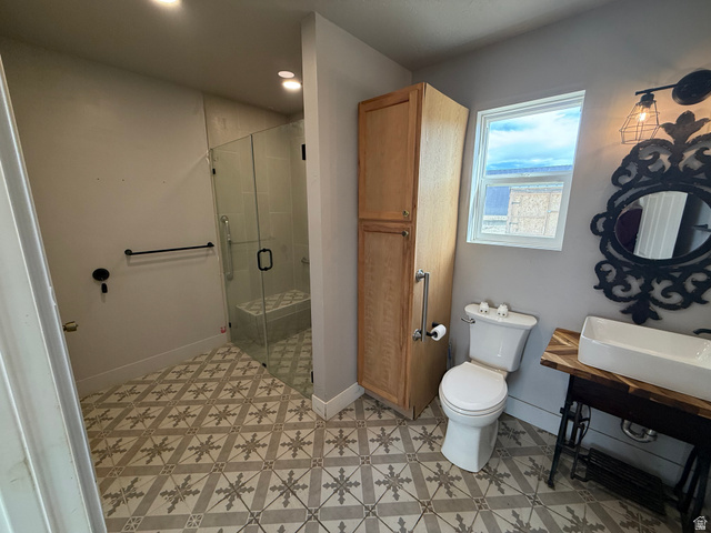 14183 High Mesa Loop Duchesne, UT 84021 - Photo 33 of 56 Full bathroom featuring a shower stall, light floors, and recessed lighting