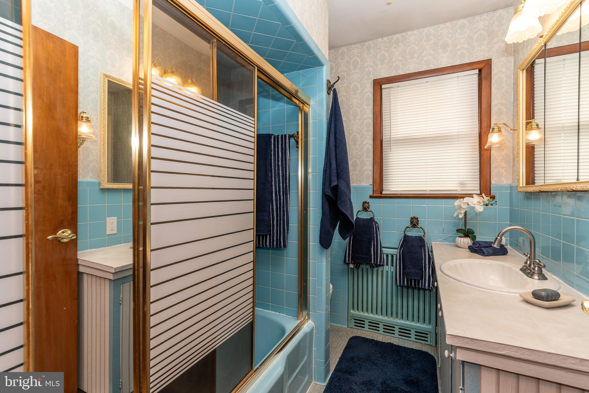 1119 Sharp Road Vineland, NJ 08360 - Photo 33 of 79 a bathroom with a sink and a shower