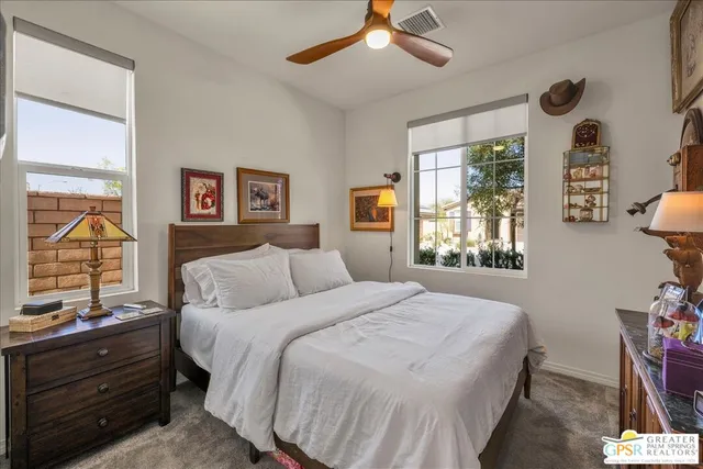 an aerial view of residential building and ocean